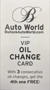 A black and white photo of an oil change card.
